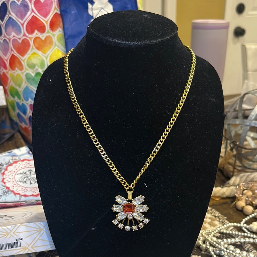 Elegant Gold Necklace with Red and Silver Accents